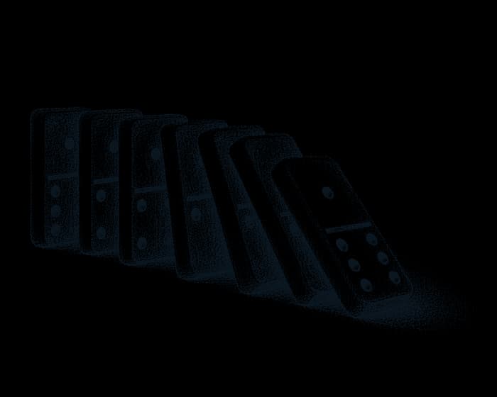Fichas de dominó cayendo en cadena